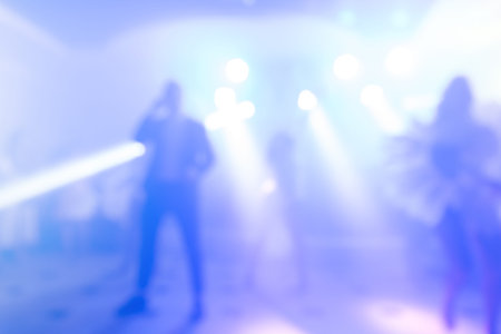 Abstract colorful background for design. Dance party in nightclub, show, light spotlights