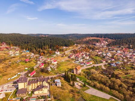 Aerial drone view of Skhidnytsia popular healing spa resort in Carpathians, Ukraine. Balneological resort with mineral springs. Autumn scenic landscapeの写真素材