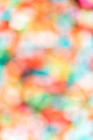 Vertical abstract colorful bokeh background for design workの写真素材