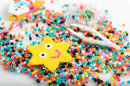 Toy in star form. Just made of fusible beads. Set, close up view.の写真素材