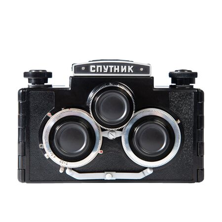 Drohobych, Ukraine - December 26, 2019: Sputnik, in Cyrillic, Soviet stereoscopic camera, retro medium-format triple-lens mirror camera, front view. Isolated on white, clipping pathのeditorial素材