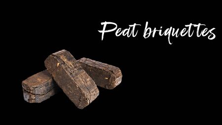 Peat briquettes on black background. Product label. Alternative fuels themeの写真素材