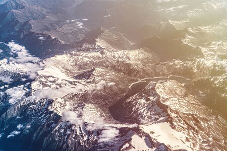 Sunny morning in Alps, Europe. Mountains range. Nature, scenic landscape from above.の写真素材
