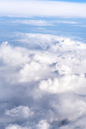 Beautiful sky above the clouds. Vertical background of cloudy skyの写真素材