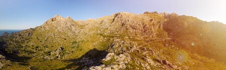 Panoramic landscape. Hairpin turn road MA-2141 between rocky mountains. Way to Sa Calobra beach, Mallorca, Balearic Islandsの写真素材