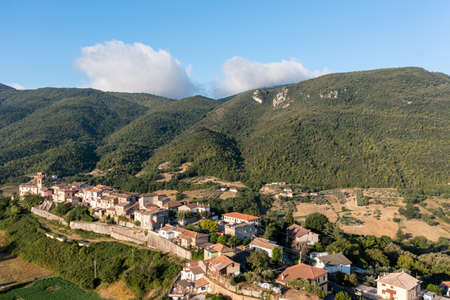 Aerial Drone view of scenic natural landscape with overlooking of architecture. The countryside in Italy. Traveling in Europe.の写真素材