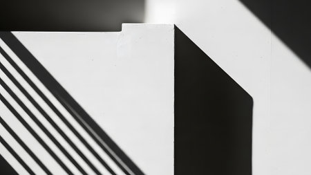 A striking black and white abstract image showcasing geometric forms, sharp lines, and dramatic shadows. The interplay of light and dark creates a dynamic and minimalist composition.の素材