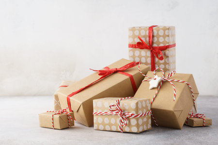 A heap of Christmas or Valentine Day gift boxes. Beautifully decorated handcrafted gifts.