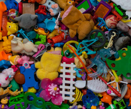 Scattered colorful plastic toys. The view from the top.の写真素材