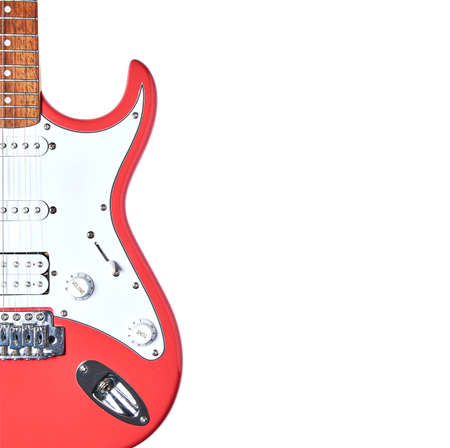 Fragment of an electric guitar on an isolated white background. Empty space for text.の写真素材