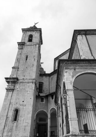 Castel di Sangro, Abruzzo, Italy. October 13, 2017. Basilica of Saint Mary enjoys the ancient fifteenth century loggia and a 14th century high relief depicting the Piet within the porchの写真素材
