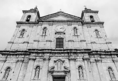 Castel di Sangro, Abruzzo, Italy. October 13, 2017. Basilica of Saint Mary enjoys the ancient fifteenth century loggia and a 14th century high relief depicting the Piet within the porchの写真素材