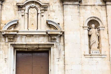 Castel di Sangro, Abruzzo, Italy. October 13, 2017. Basilica of Saint Mary enjoys the ancient fifteenth century loggia and a 14th century high relief depicting the Piet within the porchの写真素材