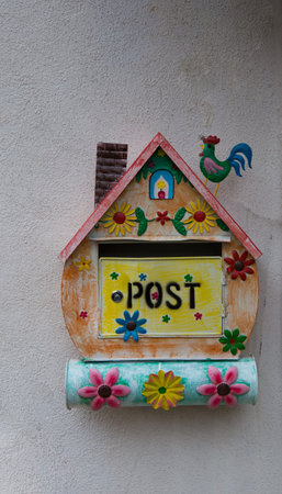 Villetta Barrea, Abruzzo, Italy. October 13, 2017. Artistic decorations attached to the wall of a dwellingの写真素材