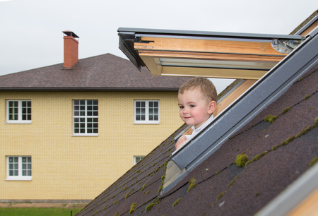 pretty little baby boy ÑÑ windowの写真素材