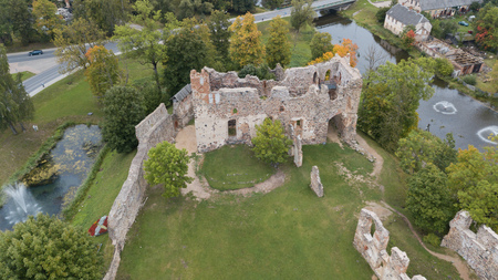 ruins of an ancient medieval castle Dobele Latvia Aerial drone top viewのeditorial素材