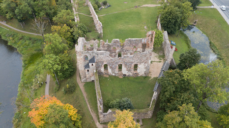 ruins of an ancient medieval castle Dobele Latvia Aerial drone top viewのeditorial素材