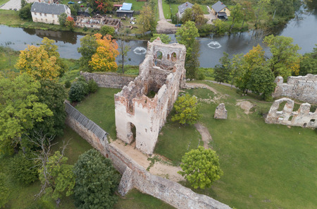 ruins of an ancient medieval castle Dobele Latvia Aerial drone top viewのeditorial素材