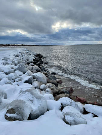 Baltic Sea winter coast beach Daugavgriva pier Latviaの写真素材