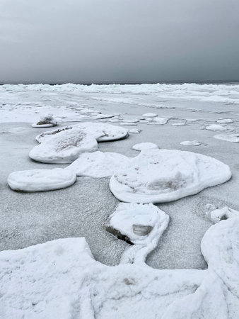 Baltic Sea winter coast beach Daugavgriva pier Latvia