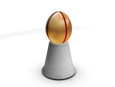 Golden egg in holderの写真素材