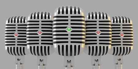 Group of microphones with green and red lightsの写真素材