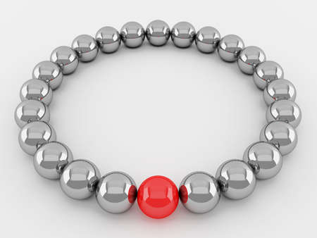 Red and group of silver balls in the ringの写真素材