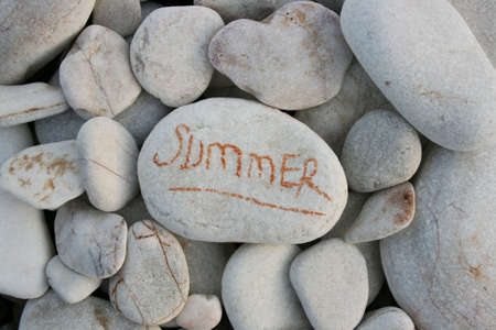 Summer writing on white stoneの写真素材