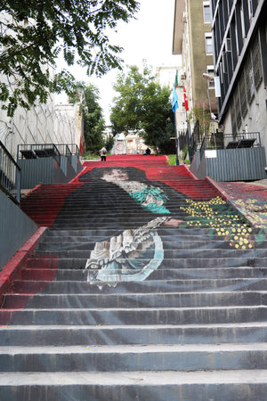 Famous Ottoman painter Osman Hamdi Bey`s `Woman With Mimosa` paint on stairs of Beyoglu, Istanbul....
