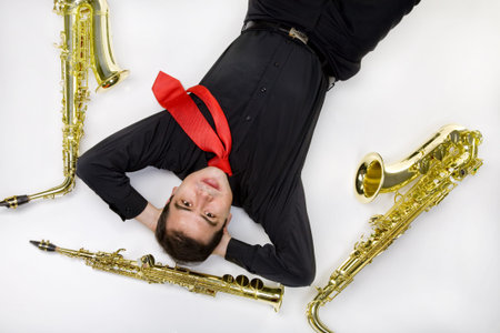 Latino Saxophone Player Isolated on Whiteの写真素材