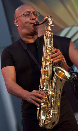 Tempe, Arizona, USA - May 29, 2010 - Alex Holland performs on saxophone at a concert by the Knee Deep Experience.のeditorial素材