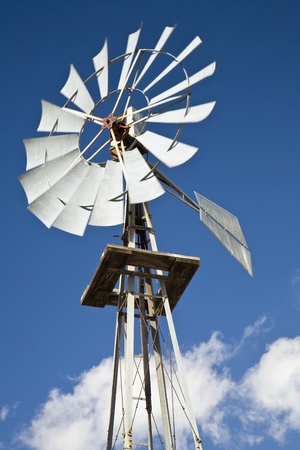 Old west-style farm windmillの写真素材