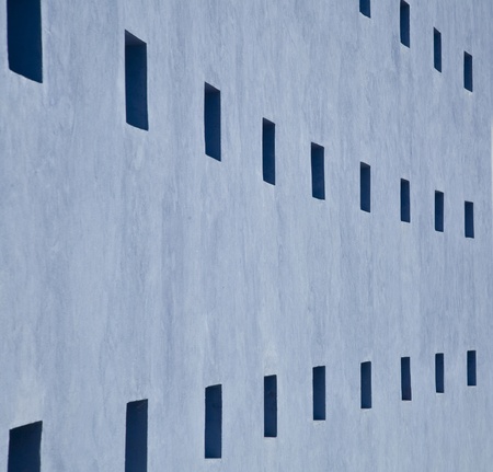 Curved Blue Wall and Windows Backgroundの写真素材