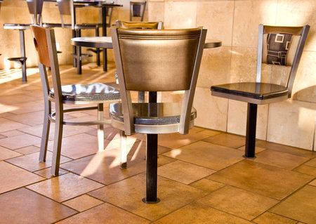 Seats and table at a fast food resturant.の写真素材