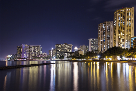 Oahu Island Hawaii skyline at Waikiki after the sun has set.の写真素材