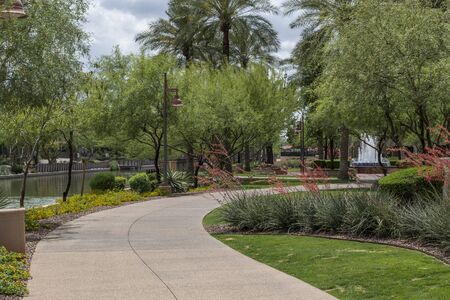 Downtown Scottsdale Arizona Waterfront District walkway along the Salt River Project canal.の写真素材