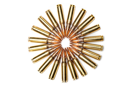 Full metal clad .303 caliber bullets for a gun arranged in a circle and isolated on a white...