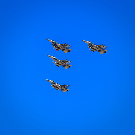 Buckeye, Arizona, USA â€“ February 19, 2022: Four F-16 Fighter Planes Flying in Formation at...