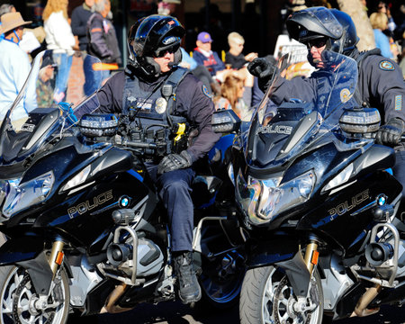 Scottsdale, Arizona, USA â€“ February 5, 2022: Two police officers mounted on motorcycles...