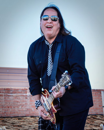Scottsdale, Arizona, USA â February 5, 2022: Guitarist Dallan Baumgarten from the local rock band Rock Lobster performs at Parada Del Sol parade event held annually in downtown Scottsdale Arizonaのeditorial素材
