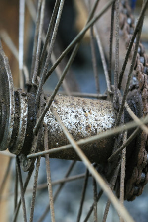 Close up of the spokes of an old bicycle