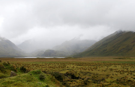At over 11,000ft in the Ecuadorian highlands the clouds mingle with the land and traditional villagers live as they did 100's of years agoの写真素材