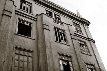 An old buildling is abandoned by it's tenentsの写真素材