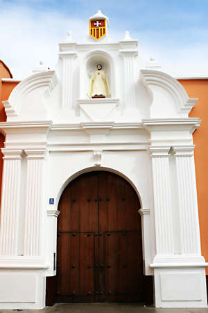 The exterior doors of a beautiful colonial church in Trujillo Peruの写真素材