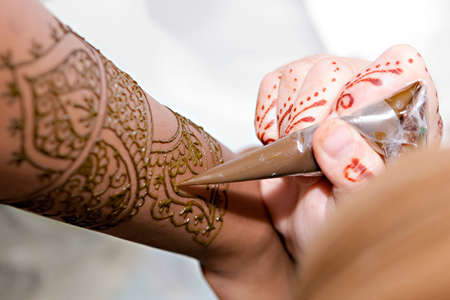 A Hindu Bride has Henna applied to her handsのeditorial素材