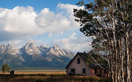 Mormon house below Grand Teton mountain rangeのeditorial素材