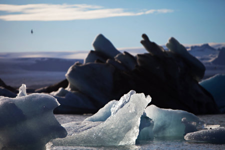 Melting glacier ice at Jokulsarlon lake caused by global warming