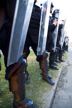 Special police forces cordon at the demonstration blocking street protestsの写真素材