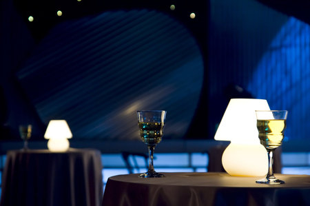  evening in restaurant with white wine and lamp