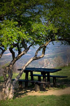 Empty picnic table - very beautiful view on the villageの写真素材